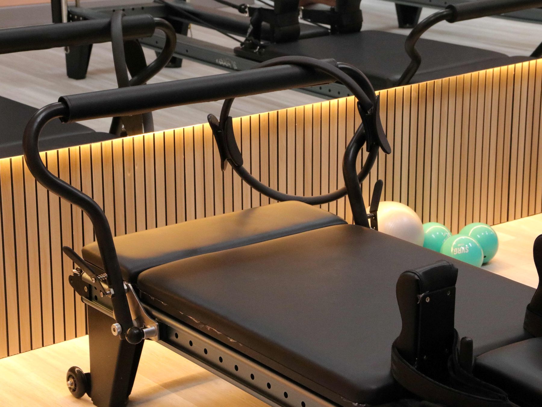 A bright and airy pilates studio space.